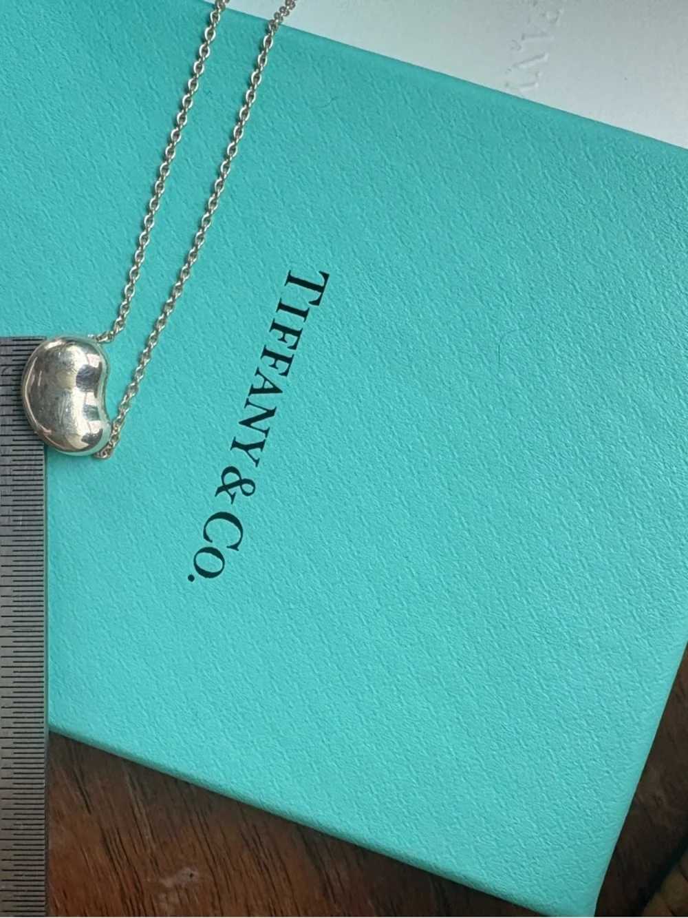Tiffany & Co. Silver Bean Pendant Necklace with Tiffany Blue Accents - Picture 3 of 3